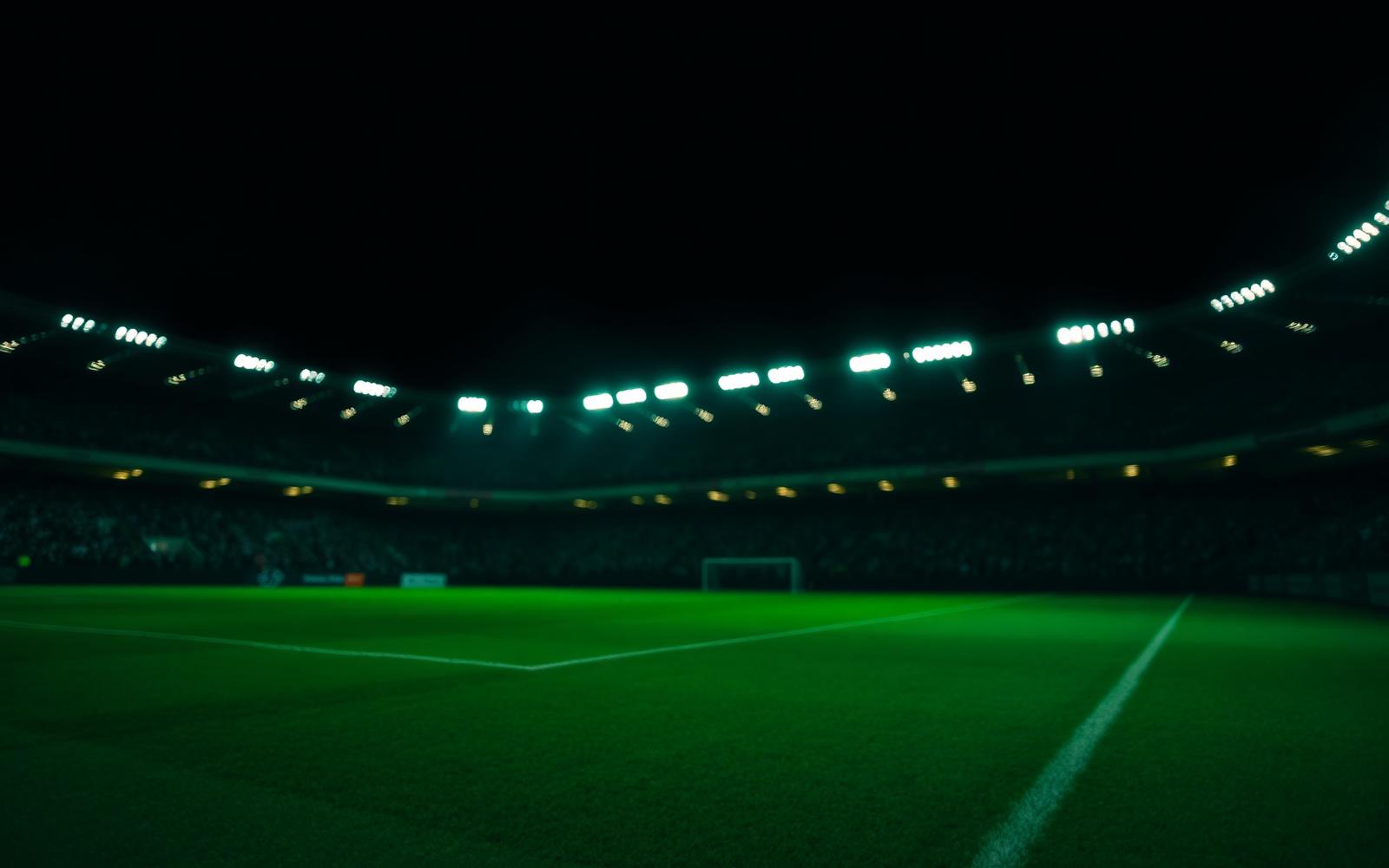 Estádio de futebol iluminado à noite